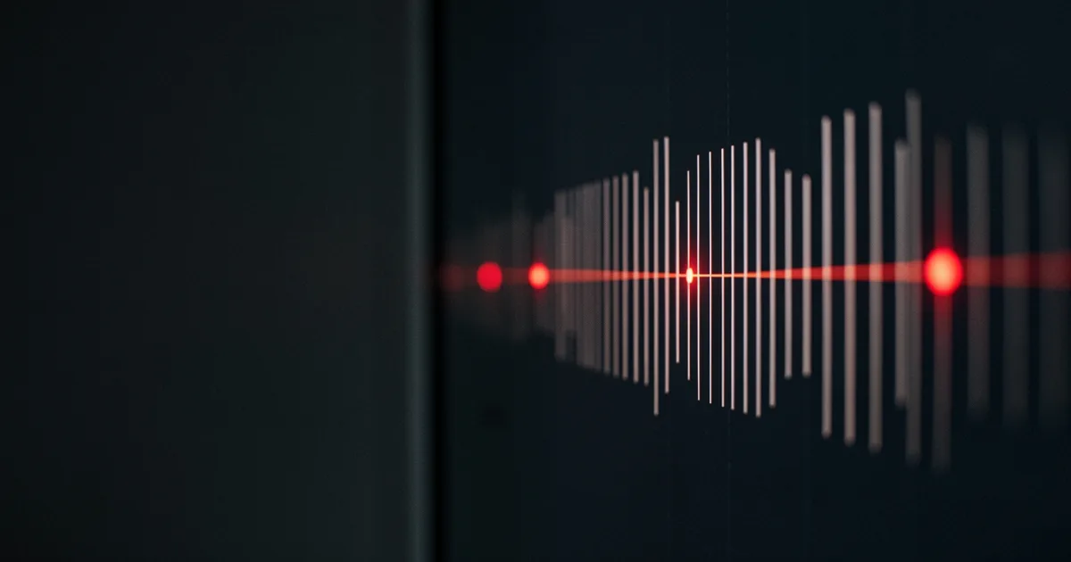 A row of thin vertical light bars on dark glass like a timeline, with red markers